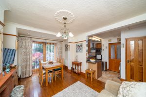 DINING/SITTING ROOM OPENS TO KITCHEN- click for photo gallery